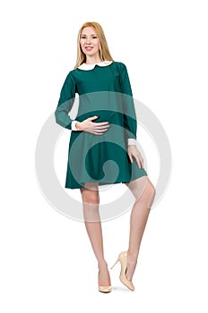 Beautiful pregnant woman in green dress isolated