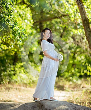 Beautiful pregnant woman with her husband