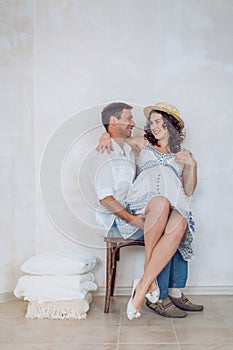 Beautiful pregnant woman and her husband