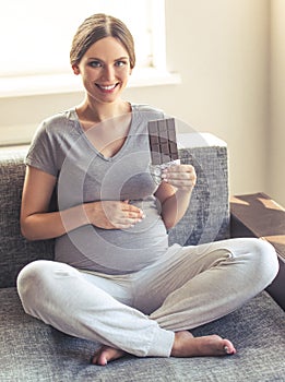 Beautiful pregnant woman at home