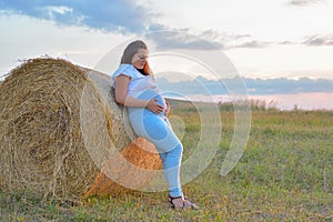 Beautiful pregnant woman outdoor