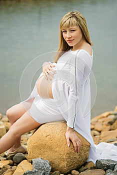 Beautiful pregnant woman outdoor