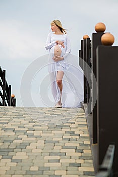 Beautiful pregnant woman outdoor