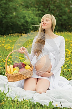 Beautiful pregnant woman outdoor