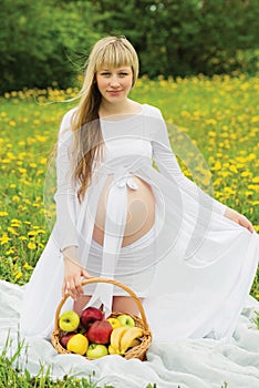 Beautiful pregnant woman outdoor