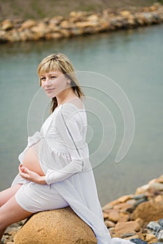 Beautiful pregnant woman outdoor