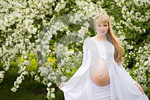 Beautiful pregnant woman outdoor