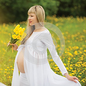 Beautiful pregnant woman outdoor