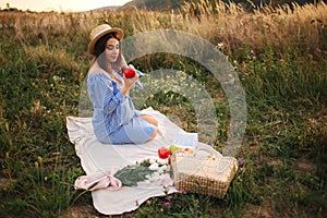 Beautiful pregnant woman show and eat red apple. Healthy food. Fresh fruits. Happy woman smile