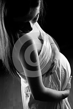 Beautiful pregnant woman in studio