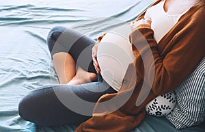 Beautiful pregnant woman waiting of a baby.