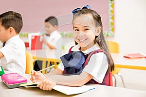 Beautiful preschool student in a classroom