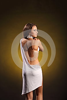 Beautiful professional dancer performs latino dance. Passion and expression.