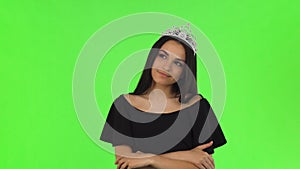 Beautiful prom queen wearing a crown on chromakey background
