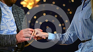 Beautiful proposes wedding woman closeup on background firework putting ring.