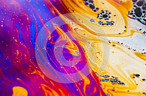 Beautiful psychedelic abstraction formed by light on the surface of a soap bubble