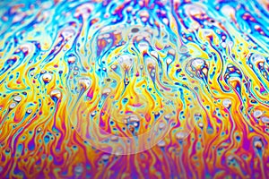 Beautiful psychedelic abstraction formed by light on the surface of a soap bubble