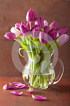 Beautiful purple tulip flowers bouquet in vase