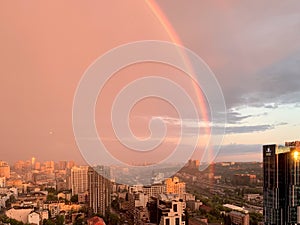 Beautiful rainbow in background blue sky in the city