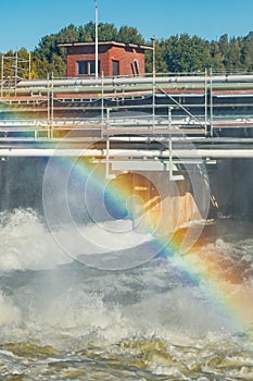 Beautiful rainbow on bypass at rapids Kuusankoski, Finland