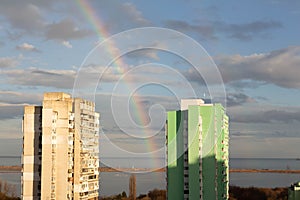 Beautiful rainbow, cloudy sky