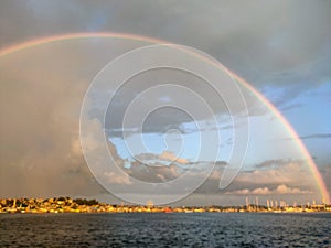 Beautiful rainbow at sea after rain