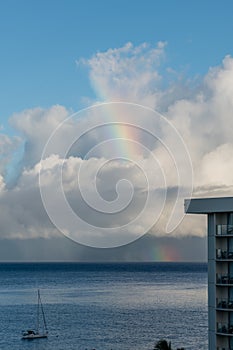 Beautiful rainbow vista at dawn, Kaanapali Beach, Maui