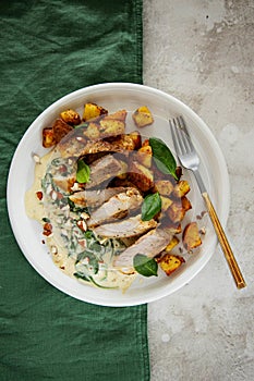 Beautiful ready-made dish of meat and potatoes on a stylish plate