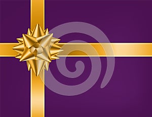 Beautiful realistic crossed golden ribbon and satin or silk loopy bow on purple background. Elegant holiday decorative