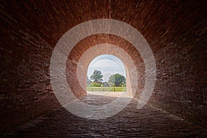 Beautiful red brick tunnel scenic of the Eternal golden castle