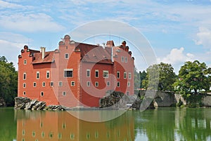 Beautiful red castle Cervena Lhota in the Czech Republic looking like from fairy tale