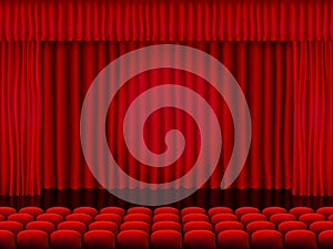 Beautiful red cinema hall with seats facing red folded curtain drapes on a black stage vector