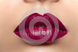 Beautiful red female lips closeup