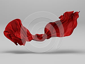 Beautiful red flowing fabric flying in the wind