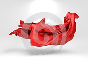 Beautiful red flowing fabric flying in the wind