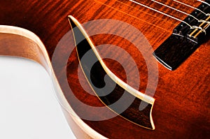 Beautiful red guitar and its parts.Guitar background.Guitar strings photo