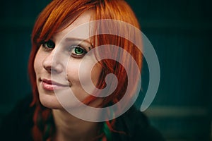 Beautiful red hair girl with deep green eyes