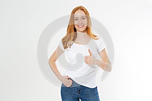 Beautiful red hair girl show like sign on a white t-shirt isolated. Pretty smile red head woman in tshirt mock up, blank