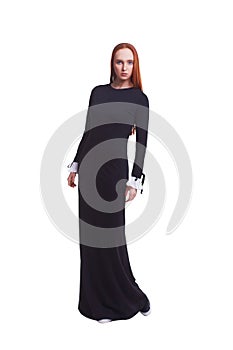 Beautiful red hair women model in long black dress