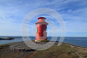 Beautiful Red Lighthouse in West Iceland on Snaefellsnes Peninsula photo