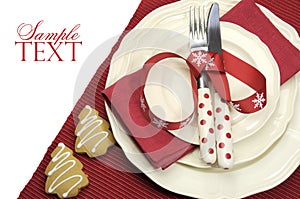 Beautiful red theme festive Christmas dining table place setting