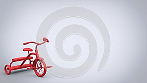 Beautiful red toy tricycle - bright background