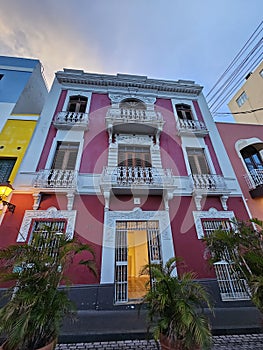 Beautiful red wall house with white balcony in Old San Juan,  Puerto Rico