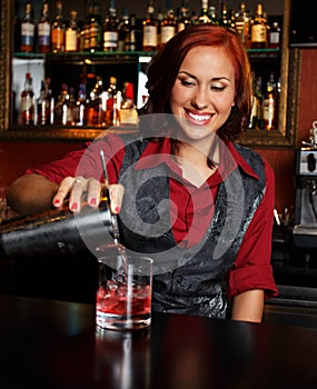 Beautiful redhead barmaid