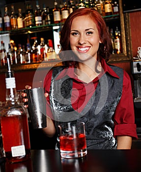 Beautiful redhead barmaid