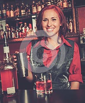 Beautiful redhead barmaid