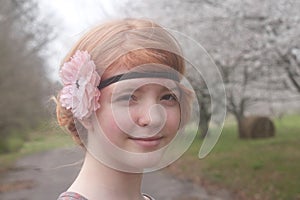 Beautiful Redhead With Blooming Cherry Trees