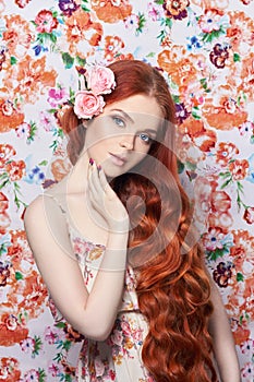 beautiful redhead girl with long hair. Perfect woman portrait with a colored light background. Gorgeous hair and deep eyes