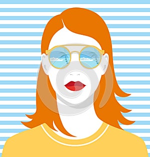 Beautiful redhead woman with golden mirrored sunglasses