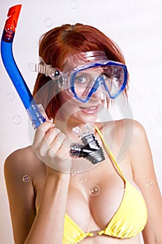 Beautiful redhead woman in snorkeling gear